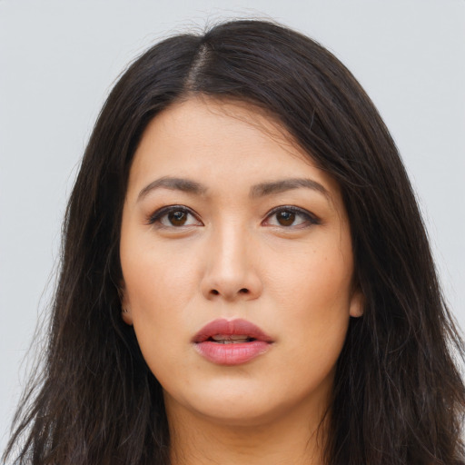 Neutral latino young-adult female with long  brown hair and brown eyes