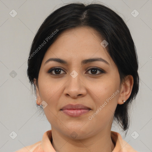 Joyful latino young-adult female with medium  brown hair and brown eyes