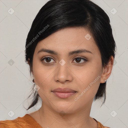 Joyful asian young-adult female with medium  black hair and brown eyes