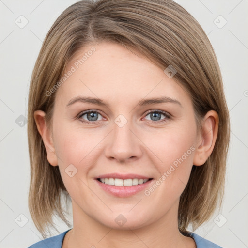 Joyful white young-adult female with medium  brown hair and grey eyes