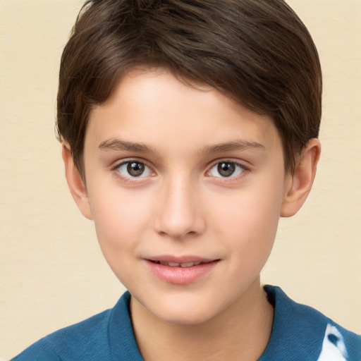 Joyful white child male with short  brown hair and brown eyes