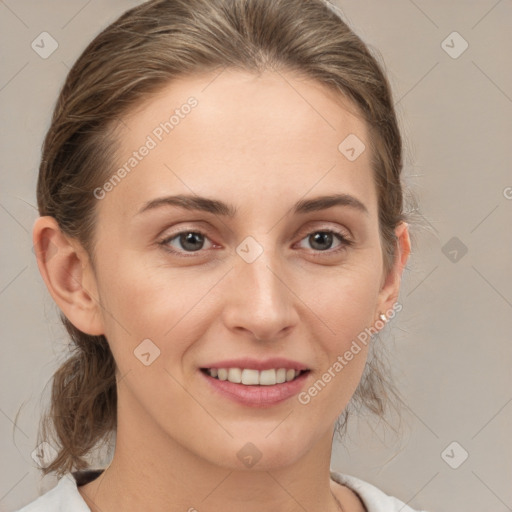 Joyful white young-adult female with medium  brown hair and grey eyes