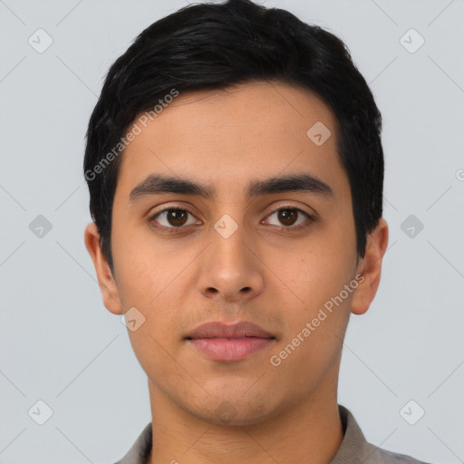 Neutral latino young-adult male with short  black hair and brown eyes