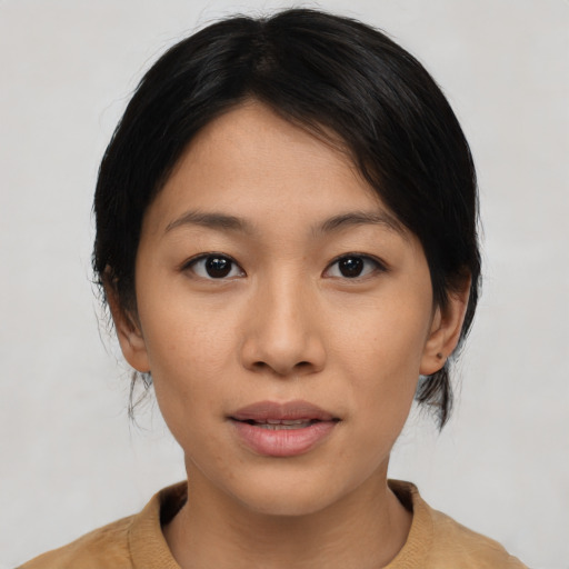 Neutral asian young-adult female with medium  black hair and brown eyes