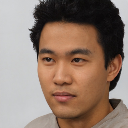 Neutral asian young-adult male with short  black hair and brown eyes