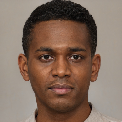 Neutral black young-adult male with short  brown hair and brown eyes