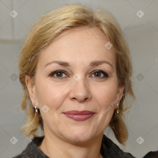 Joyful white adult female with medium  brown hair and brown eyes