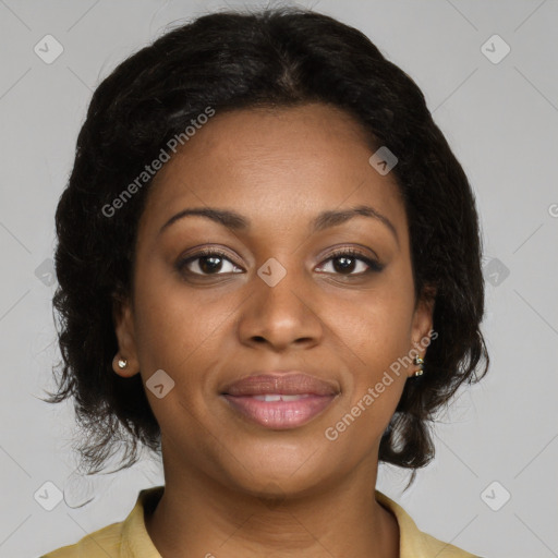 Joyful black young-adult female with medium  brown hair and brown eyes