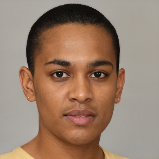 Neutral latino young-adult male with short  brown hair and brown eyes