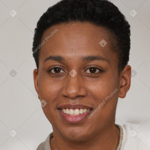 Joyful black young-adult female with short  brown hair and brown eyes