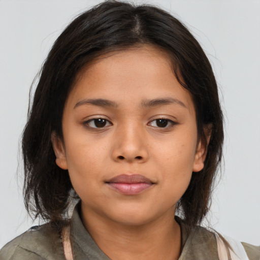 Neutral latino young-adult female with medium  brown hair and brown eyes