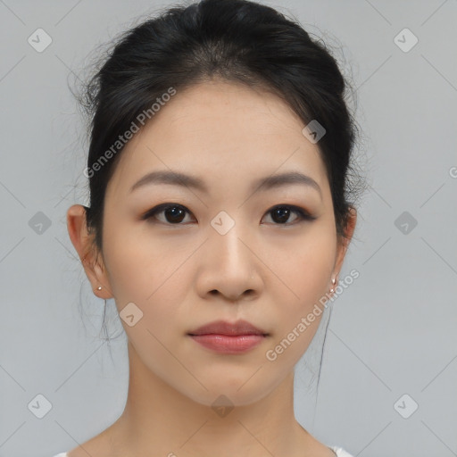 Neutral asian young-adult female with medium  brown hair and brown eyes