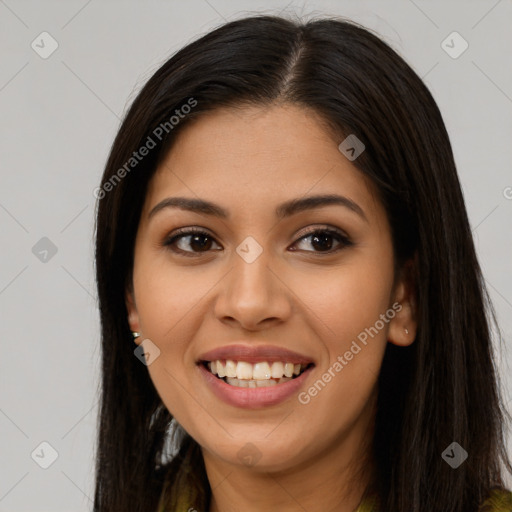 Joyful latino young-adult female with long  brown hair and brown eyes