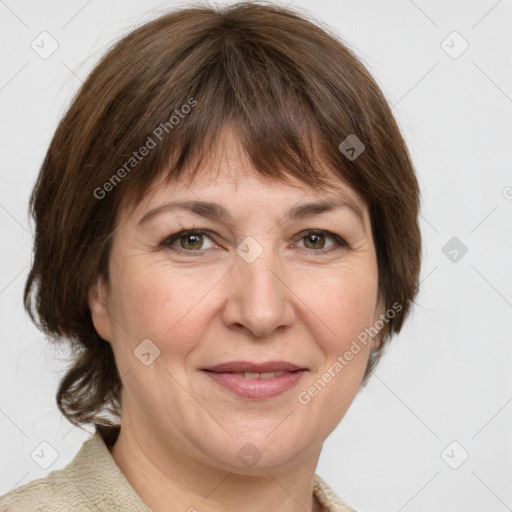 Joyful white adult female with medium  brown hair and grey eyes