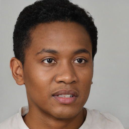 Neutral black young-adult male with short  brown hair and brown eyes