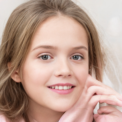 Joyful white child female with medium  brown hair and blue eyes