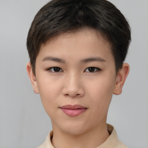 Joyful asian young-adult female with short  brown hair and brown eyes