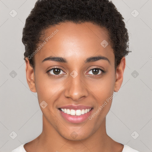 Joyful white young-adult female with short  brown hair and brown eyes