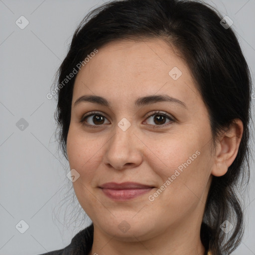 Joyful white adult female with medium  brown hair and brown eyes