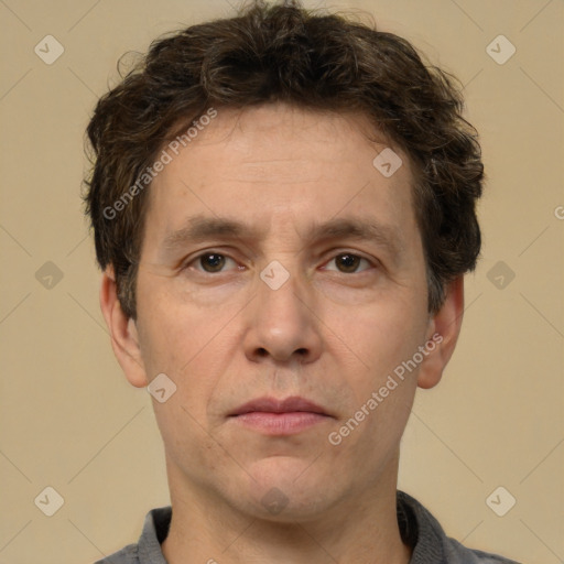 Neutral white adult male with short  brown hair and brown eyes