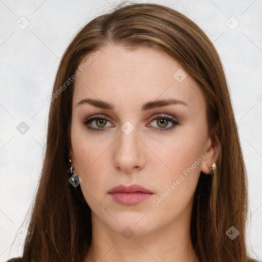 Neutral white young-adult female with long  brown hair and brown eyes