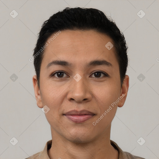 Joyful latino young-adult male with short  black hair and brown eyes