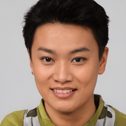 Joyful asian young-adult female with short  black hair and brown eyes
