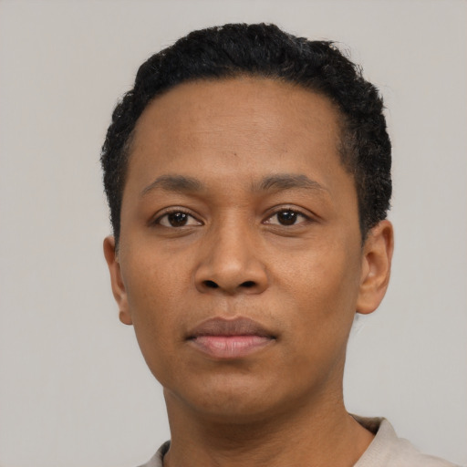 Neutral black young-adult male with short  black hair and brown eyes