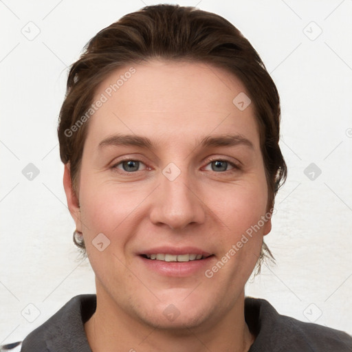 Joyful white young-adult female with short  brown hair and grey eyes