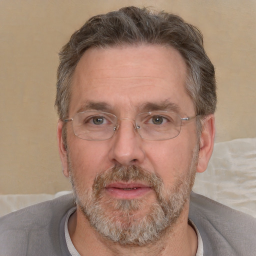 Neutral white middle-aged male with short  gray hair and brown eyes