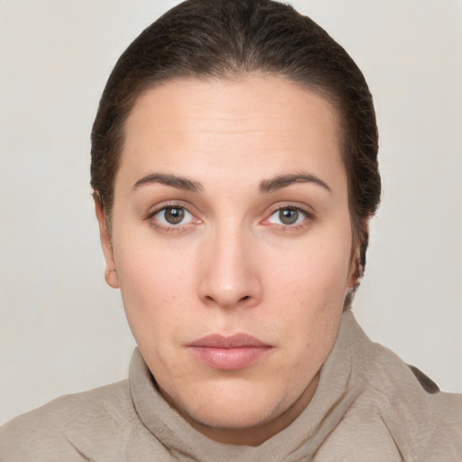 Neutral white young-adult female with short  brown hair and brown eyes