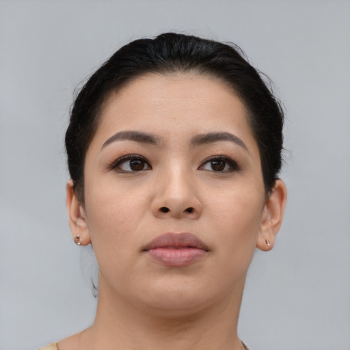Neutral asian young-adult female with short  brown hair and brown eyes