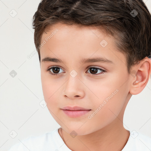 Joyful white child male with short  brown hair and brown eyes