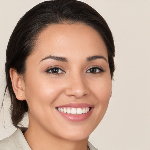 Joyful white young-adult female with medium  brown hair and brown eyes