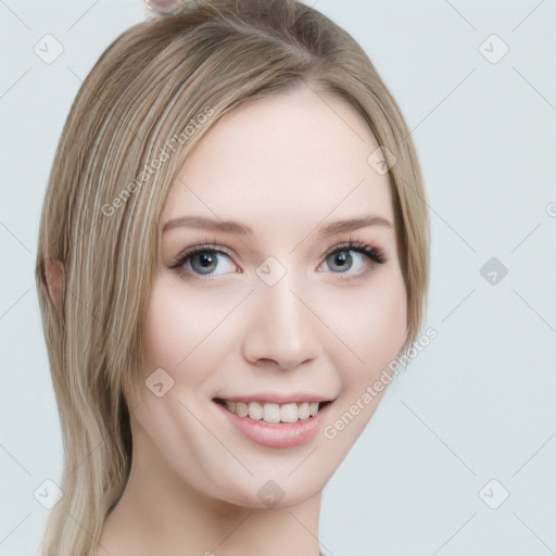 Joyful white young-adult female with long  brown hair and blue eyes