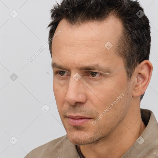 Neutral white adult male with short  brown hair and brown eyes