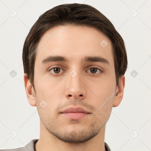 Neutral white young-adult male with short  brown hair and brown eyes