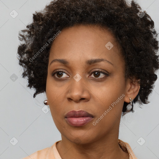 Neutral black young-adult female with short  black hair and brown eyes