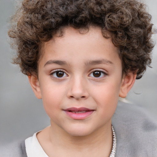 Joyful white child male with short  brown hair and brown eyes