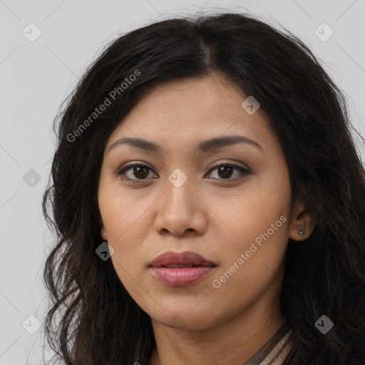 Joyful asian young-adult female with long  brown hair and brown eyes