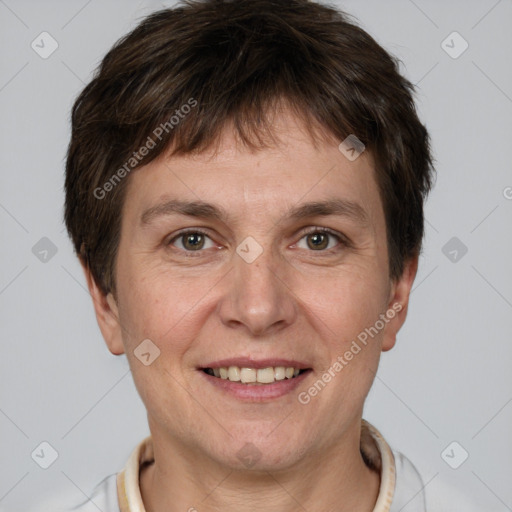 Joyful white adult male with short  brown hair and grey eyes