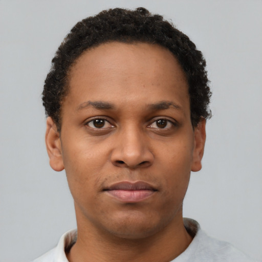 Neutral black young-adult male with short  brown hair and brown eyes