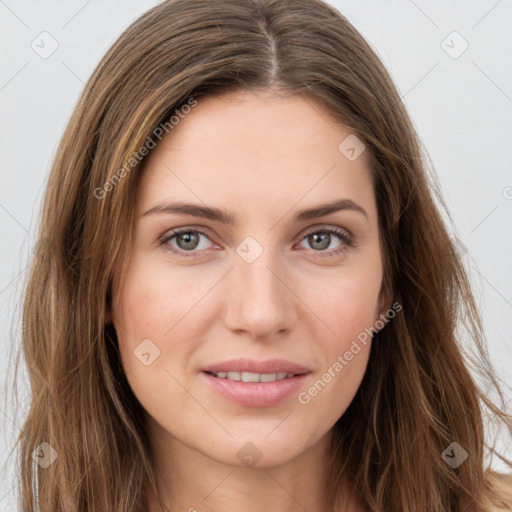 Joyful white young-adult female with long  brown hair and green eyes