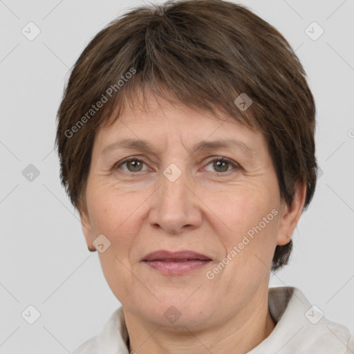 Joyful white adult female with short  brown hair and brown eyes