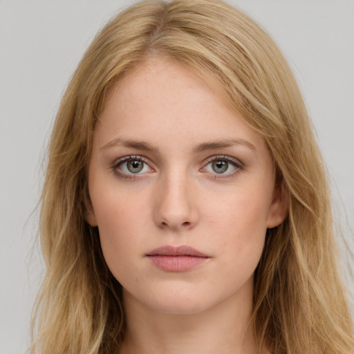 Neutral white young-adult female with long  brown hair and blue eyes