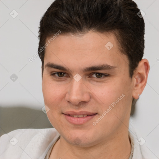 Joyful white young-adult male with short  brown hair and brown eyes