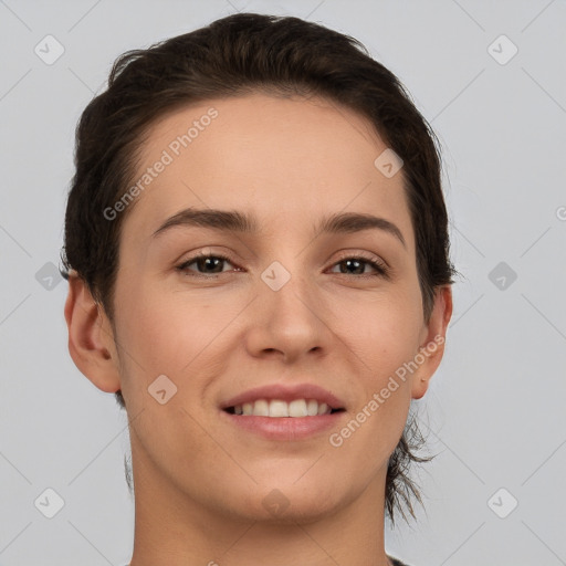 Joyful white young-adult female with short  brown hair and brown eyes