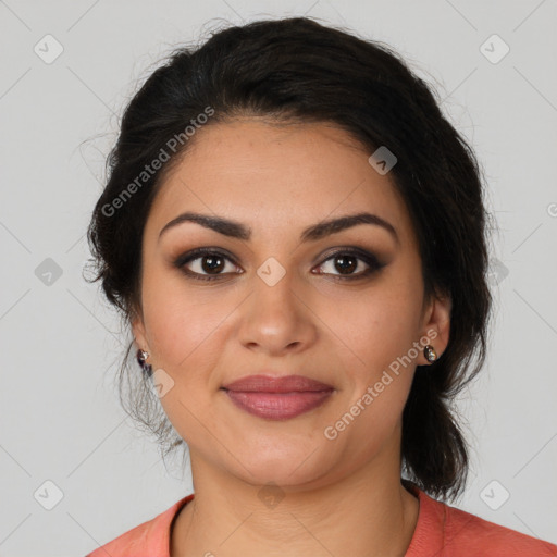 Joyful latino young-adult female with medium  brown hair and brown eyes