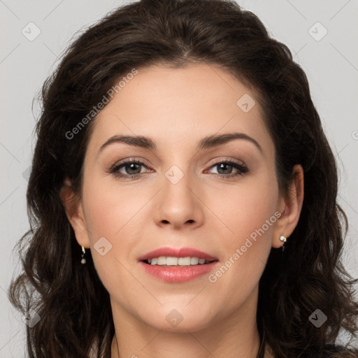 Joyful white young-adult female with long  brown hair and brown eyes