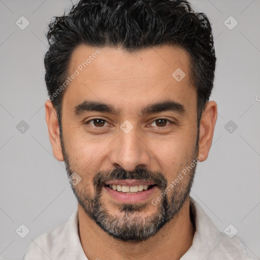 Joyful white young-adult male with short  black hair and brown eyes